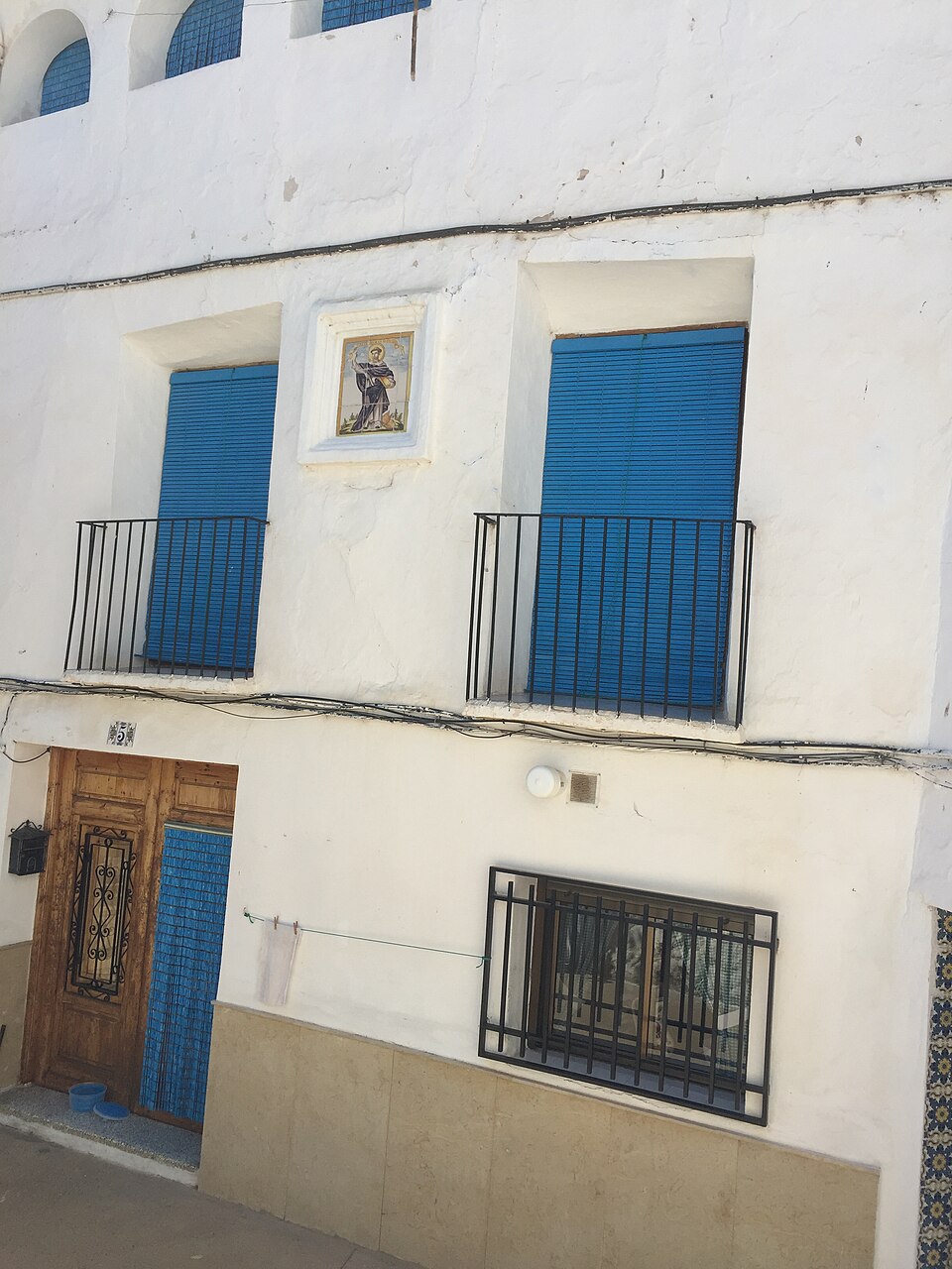 Ceramic panel of Saint Vincent Ferrer at 5 El Arrabal square